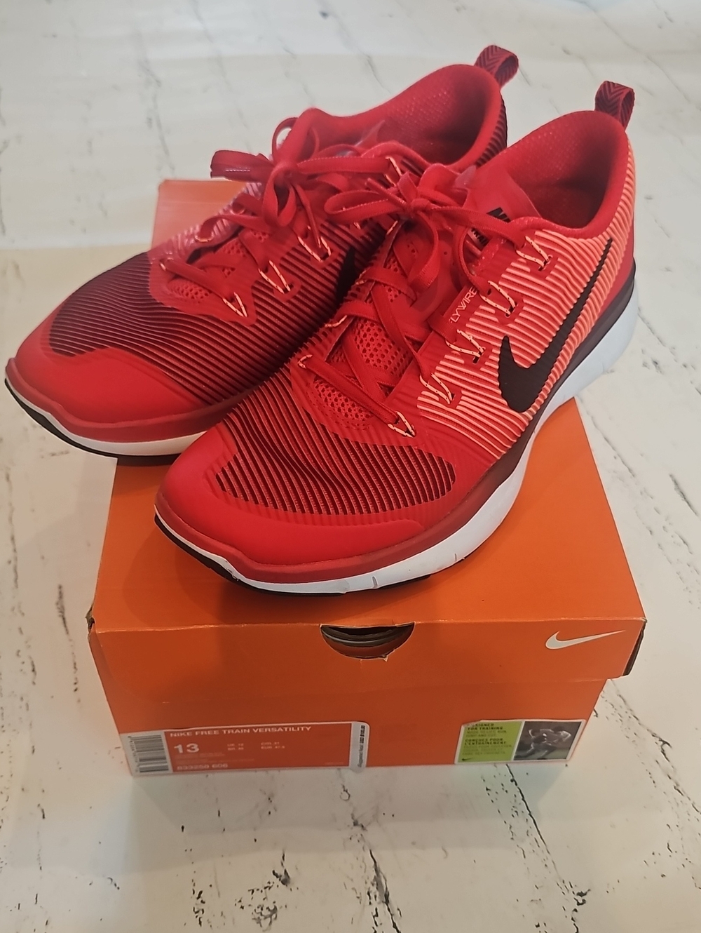 Nike Men’s Red Athletic Sneakers with Black Swoosh